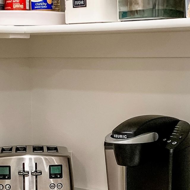 a toaster and coffee maker on a kitchen counter