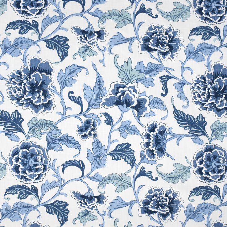 a blue and white floral pattern on fabric