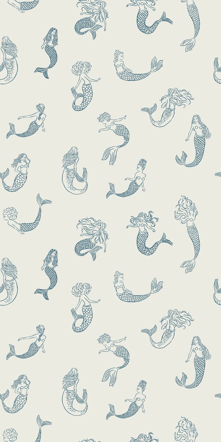 a blue and white wallpaper with various mermaids on the back ground, all in different sizes