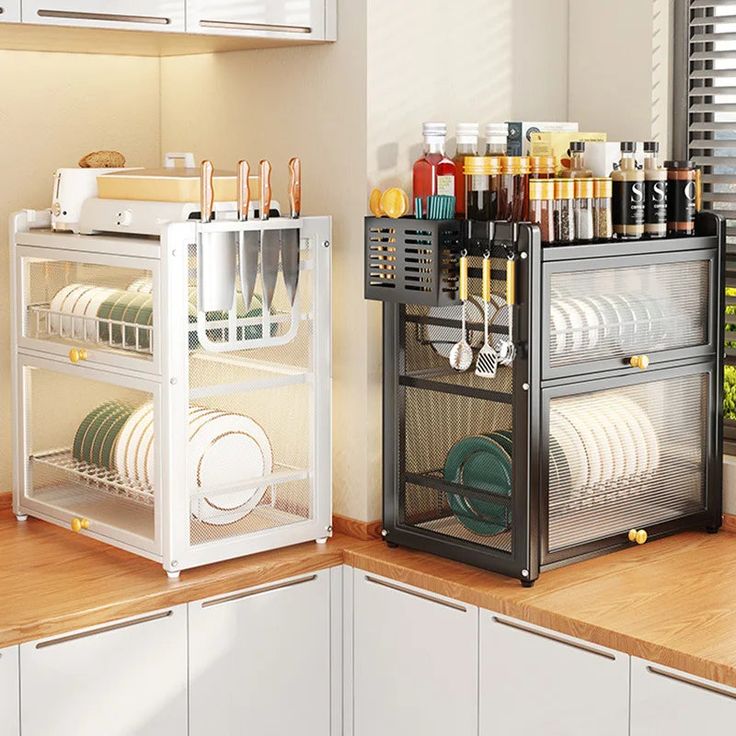 a kitchen counter with dishes and utensils in the rack on top of it