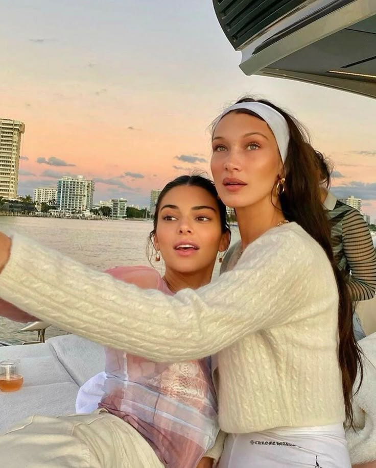 two women taking a selfie on a boat