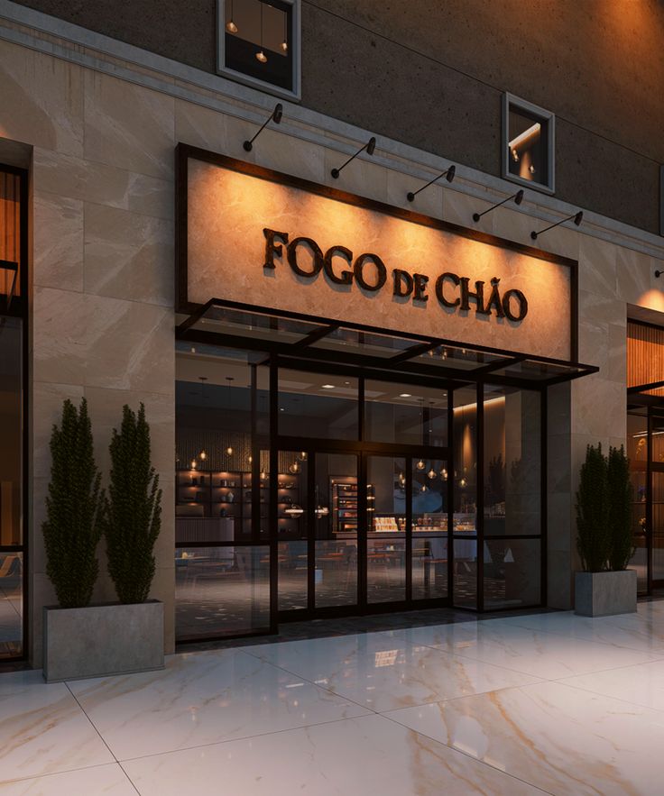 the front entrance to a restaurant called pogo de chao at night with lights on