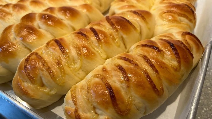 a close up of bread in a pan on a table