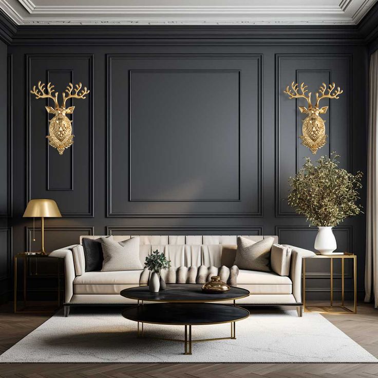 an elegant living room with black walls and gold deer head sculptures on the wall above the couch