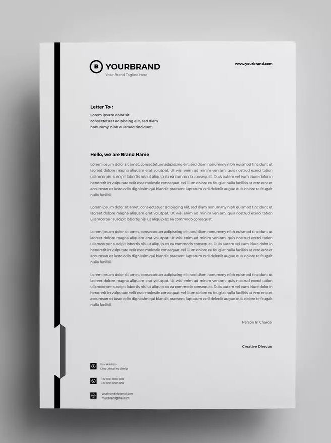 a white letterhead with black lines on it