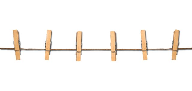 a long metal bar with five wooden bars on it's end and one is bent down