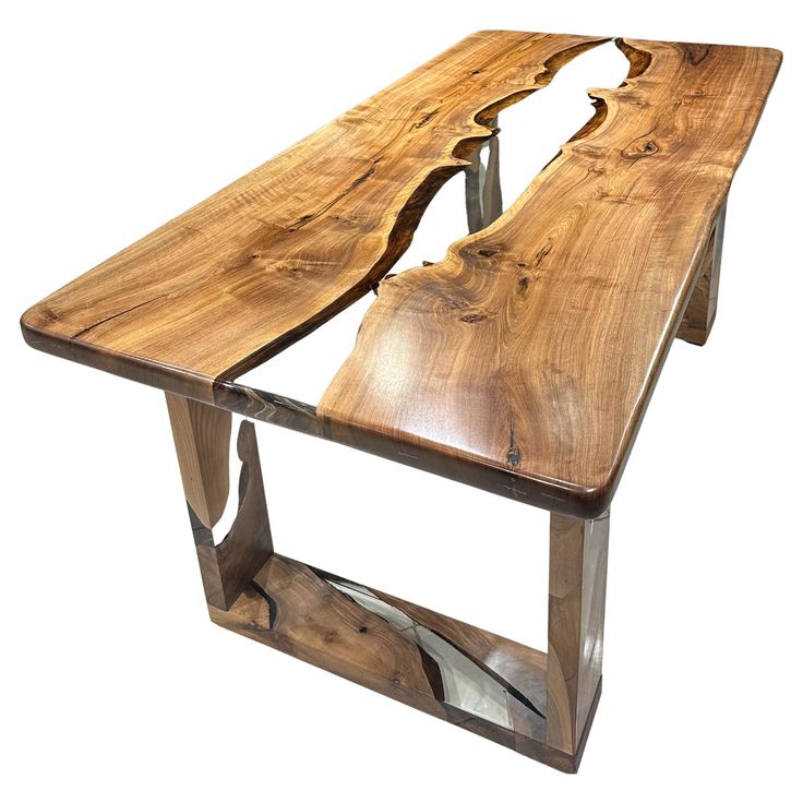 a wooden table with metal legs and a wood slab on the top that has been cut into pieces