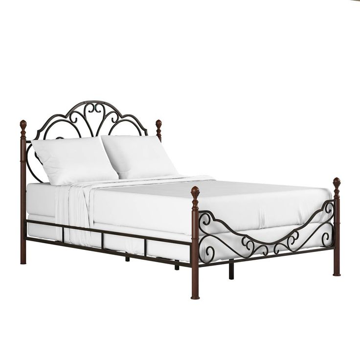 an iron bed frame with white sheets and pillows on it, against a white background