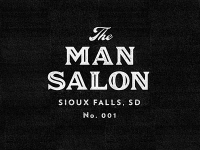 the man salon logo is shown on a black background with white lettering and an image of a