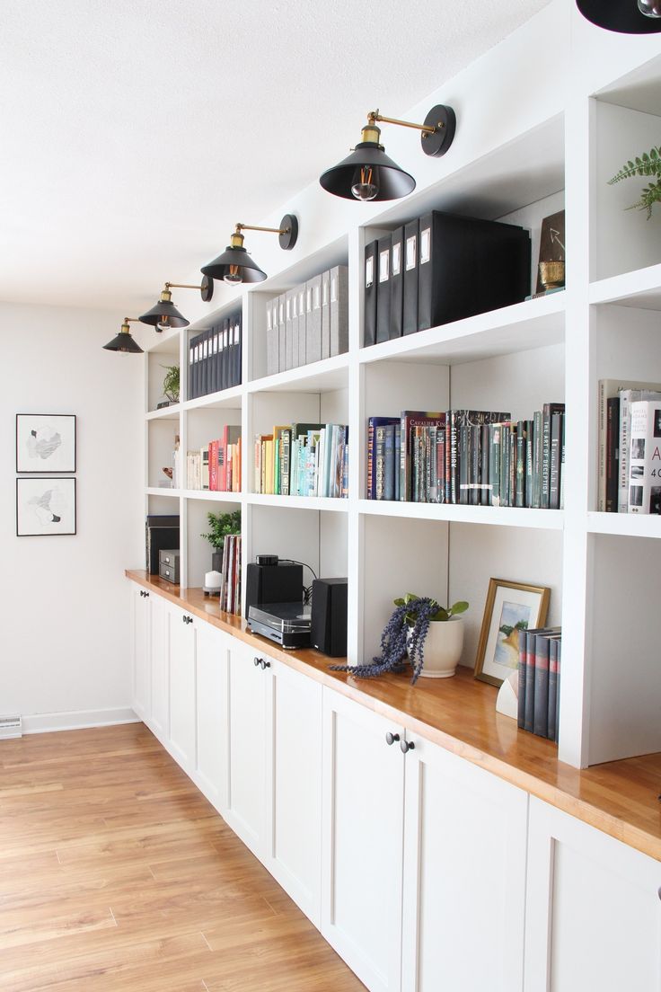 the bookshelves are filled with many different types of books