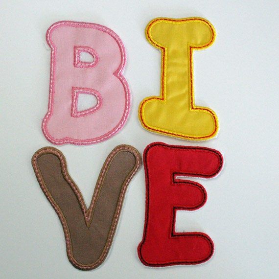 the letters i, b, and e are made out of felt