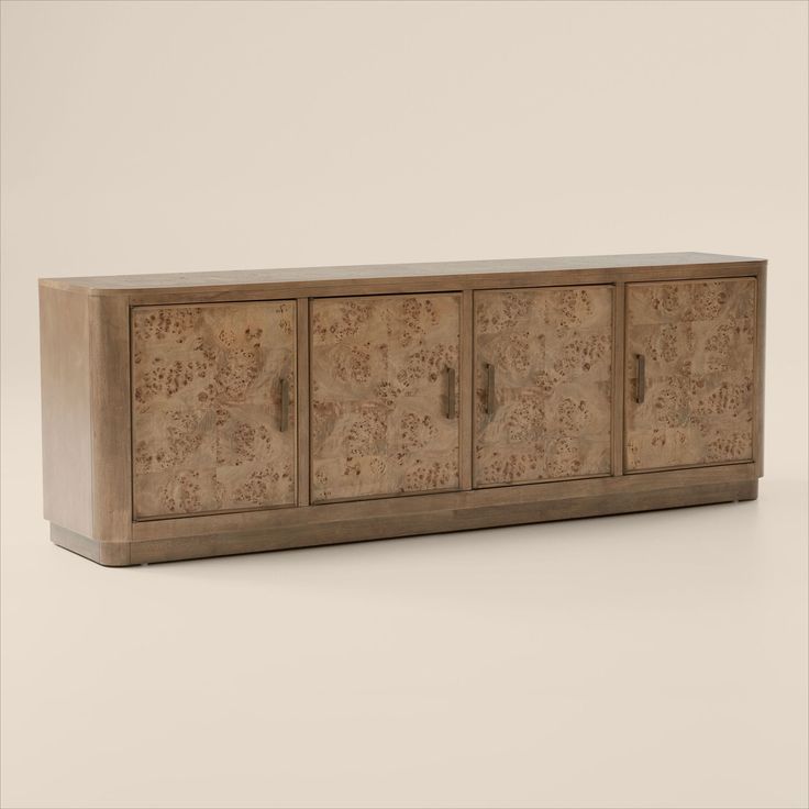 the sideboard is made out of wood and has floral designs on it