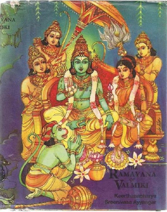 an old book with some images of deities on the front and back cover, in color