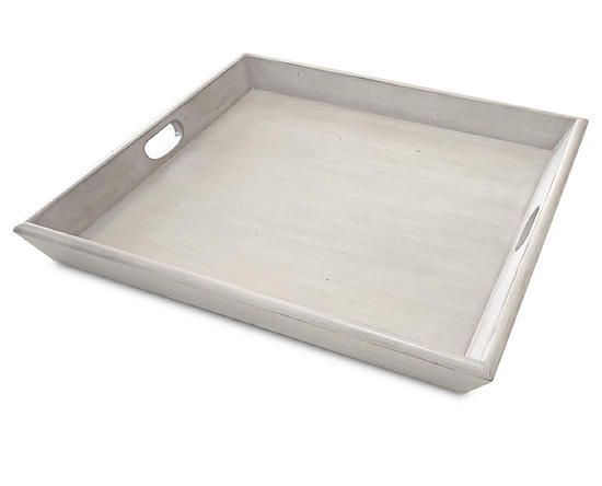 a white tray with holes in the middle on a white background, for use as a serving tray