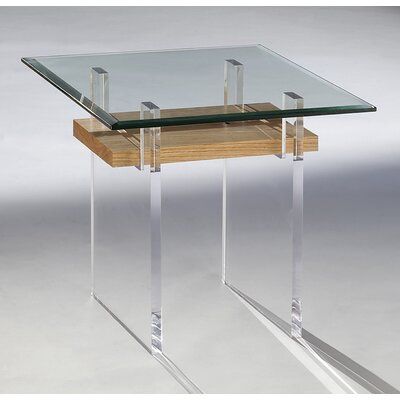 a glass and wood end table with two legs on each side, sitting against a white background