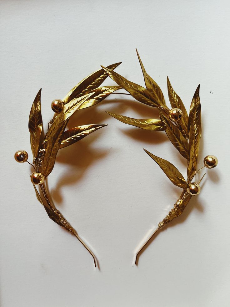 Our South of France collection is inspired by the wild rustic beauty of the southern French countryside. The eternal olive branch made with solid brass olive leaves and hematite gold olives. -leaves and fruit are individually hand wired and soldered -Olive leaves are approximately 2.5in long (6.5cm) Olive Branch Crown, Olive Crown, Darkside Tattoo, Laurel Crown, Laurel Branch, The Olive Branch, Olive Wreath, Olive Leaves, Hair Wreaths