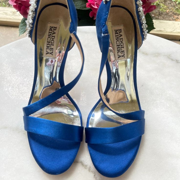 New Conditions, Only Worn Once. Badgley Mischka Women's Temple Royal Blue Satin Stiletto Heels/ Open Toe Sandals/ Pump Us Size 7/ Eu 37-38 (Measure 9.1/4inches & 23.5 Cm) ~ 4" Heel Height Gorgeous Royal Blue Satin Heels Perfect For Any Occasion Or Event. Comfortable Enough To Dance At Weddings. Embellished Heel With Rhinestones, An Elegant Array Of Crystals Flowers Wrap The Back Of A Glamorous D'orsay Pump Styled With A Flirty Open Toe. Latex-Foam Cushioned Footbed Textile Upper/Leather Sole Blue Satin Heels, Embellished Heels, Satin Heels, Open Toe Sandals, Toe Sandals, Blue Satin, Blue Rhinestones, Badgley Mischka, Shoes Women Heels