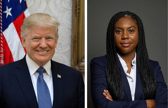 two women and one man are standing in front of an american flag, both wearing business attire