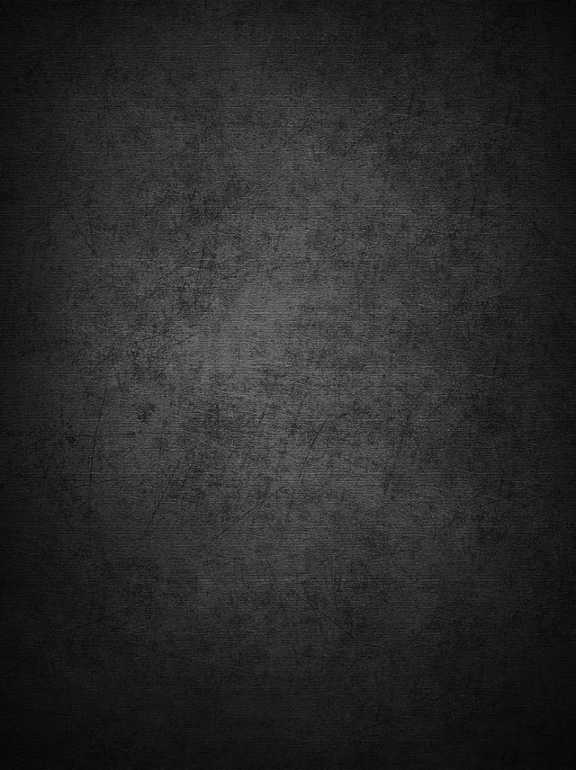 black grungy textured background with space for text or image