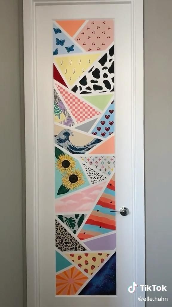 the door is decorated with colorful paper and has a bird on it's side