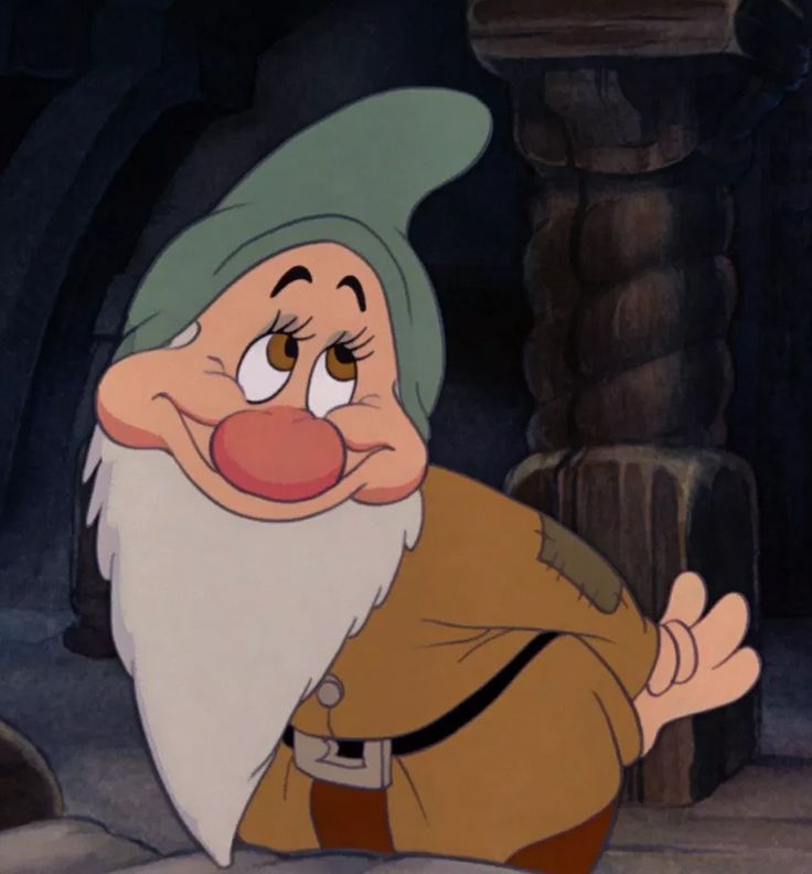 an animated character is standing in front of a stone wall and looking at the camera