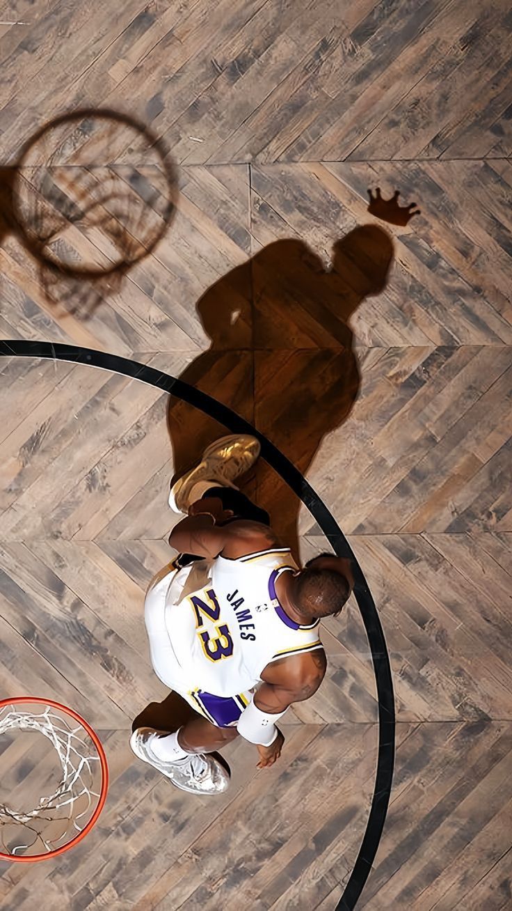 an overhead view of a basketball player in the hoop