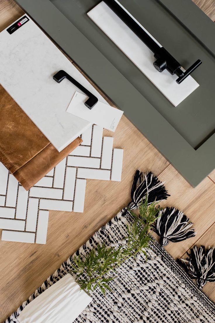 an overhead view of a living room with wood flooring and rugs on the floor