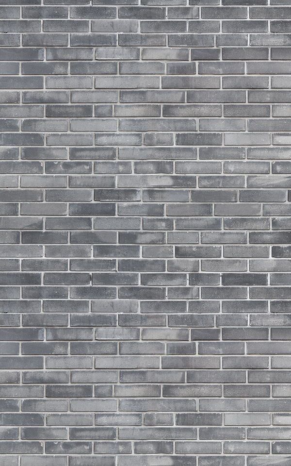 a gray brick wall with no mortar or mortars