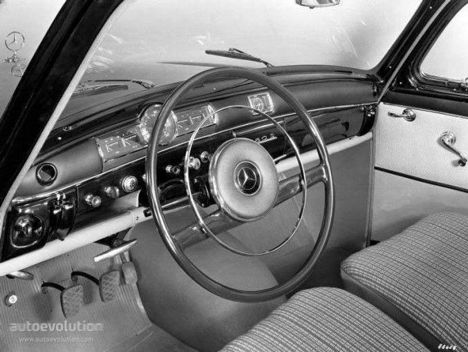 the interior of an old car is shown in black and white