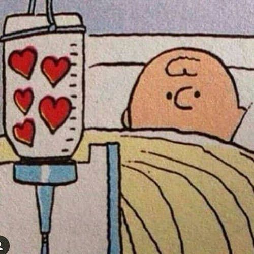 a drawing of a man in bed with hearts on his chest and an iv bag