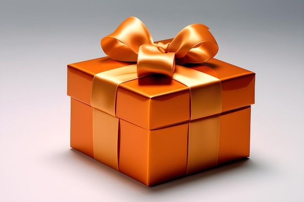 an orange gift box with a bow on the top is shown in front of a gray background