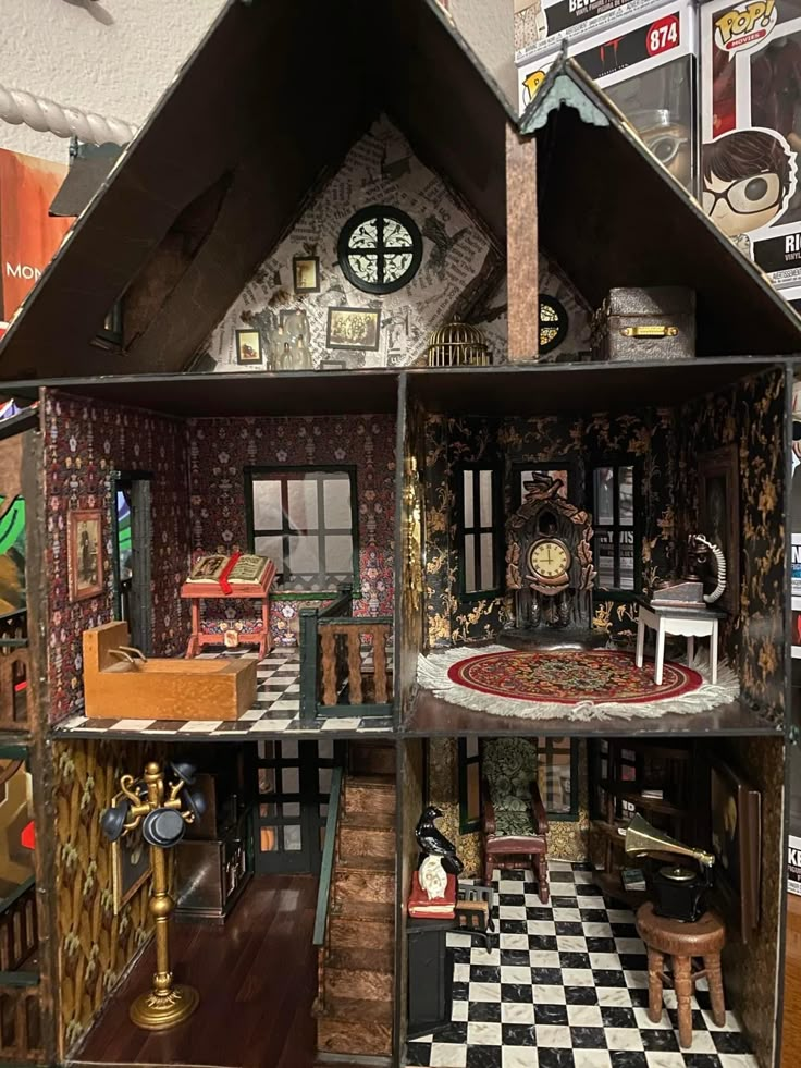 a doll house with lots of furniture and accessories on display in a room filled with other items