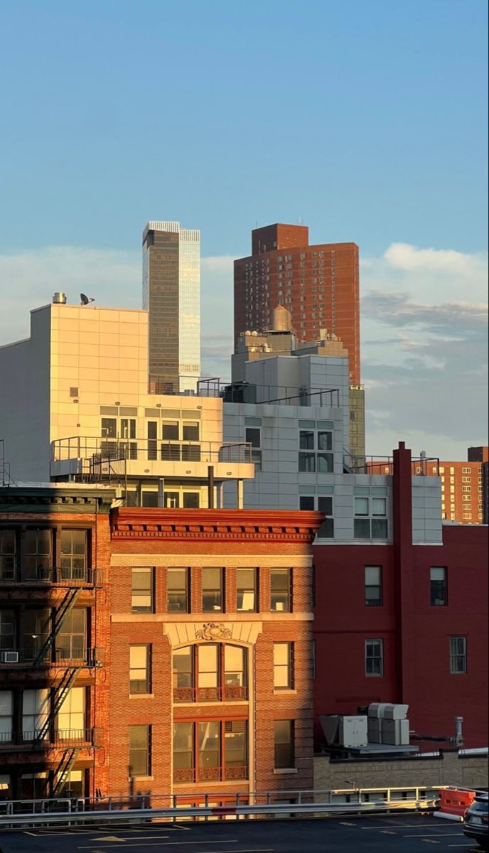 a city skyline with tall buildings in the background