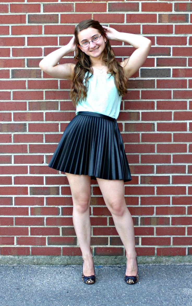 I love the sassy vibe of this pleated faux-leather skirt, and these leopard print heels. I love the way leather and Tiffany blue look together and adding that girly pop of print at the bottom completed the look perfectly. Shirt: H&M Skirt: H&M Shoes: Steve Madden via Wearhouse Necklace: Gifted Photo courtesy of Devan Chirgwin. Trends And Tolstoy, Girly Pop, Rok Mini, Looks Pinterest, Cute Skirt Outfits, Girls In Mini Skirts, Leopard Print Heels, Best Cell Phone, Leather Mini Skirt