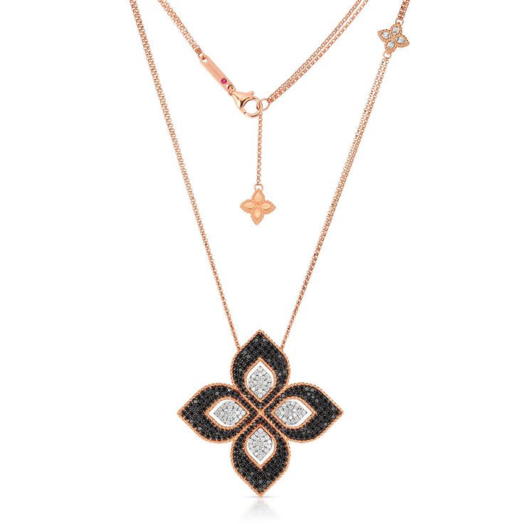 You'll feel like royalty when you wear this necklace from Roberto Coin's Princess Flower collection. Crafted in 18K rose gold, it features a large floral-motif pendant with black and white diamonds front and center, with a smaller like-designed station mid-piece embellished with white diamonds, and another in complexion-complementing precious metal at the end of the accompanying 32" chain. This Roberto Coin pendant necklace will be one of the crowning glories in your jewelry box. Roberto Coin Jewelry, Rose Gold Diamond Necklace, Jewellery Design Sketches, Princess Flower, Princess Necklace, Coin Pendant Necklace, Flower Collection, Flower Black, Roberto Coin