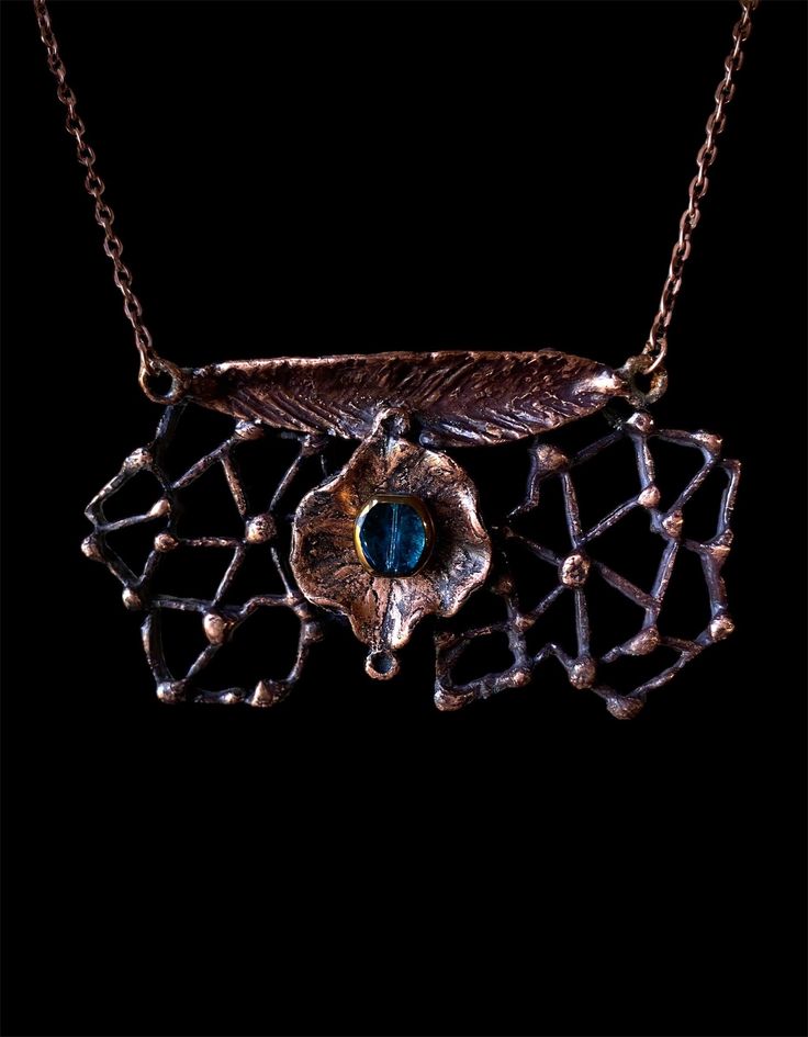 An assemblage of metal jewelry pieces, fixed together, then copperplated (electroformed) by me.  This large eye catching pendant piece is unique and  beautiful!   Teal/blue glass bead in center adds a bit of sparkle!   Patina added to finished copper for effect.  Matte  glaze completes piece.    Necklace is made of a  14" link chain, and about 3" for the width of the pendant, equaling about 17" for the entire circumference of necklace.  Length of pendant is about 1 1/2".  Bronze lobster claw cla Art Assemblage, Electroformed Jewelry, Copper Art, Large Eyes, Link Chain Necklace, Necklace Unique, Copper Plated, Plated Jewelry, Handmade Boho