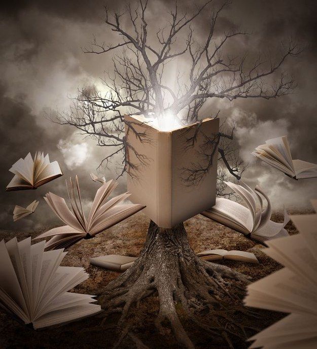 an open book sitting on top of a tree surrounded by books flying in the air