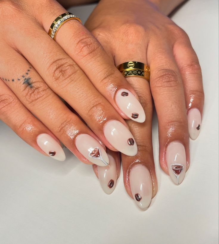 she said espresso martini nails please . ݁🍸₊ ⊹ .🫘 ݁˖ . ݁ #gelx #nails #nailinspo #nailart #naildesign #martini #espressomartini #martininails #espresso #detailednailart #almondnails Wine Theme Nails, Espresso Martini Nail Art, Champagne Bottle Nails, Martini Glass Nails, Martini Nails Designs, Dirty Martini Nails, Espresso Martini Nails, Espresso Nails, Esspresso Martini