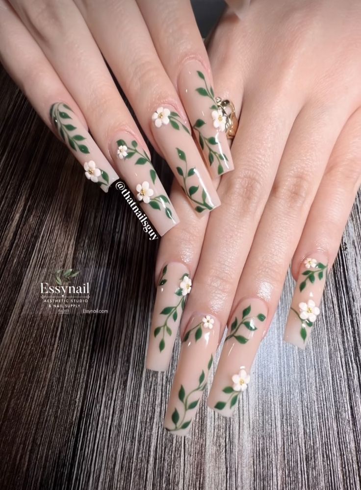 White Nails With Leaf Design, Green Vine Nail Art, Floral Coffin Nail Ideas, Plant Nails Acrylic, Green Vine Nail Designs, Plant Acrylic Nails, Nail Designs Leaves, Vine Acrylic Nails, Clear Floral Acrylic Nails