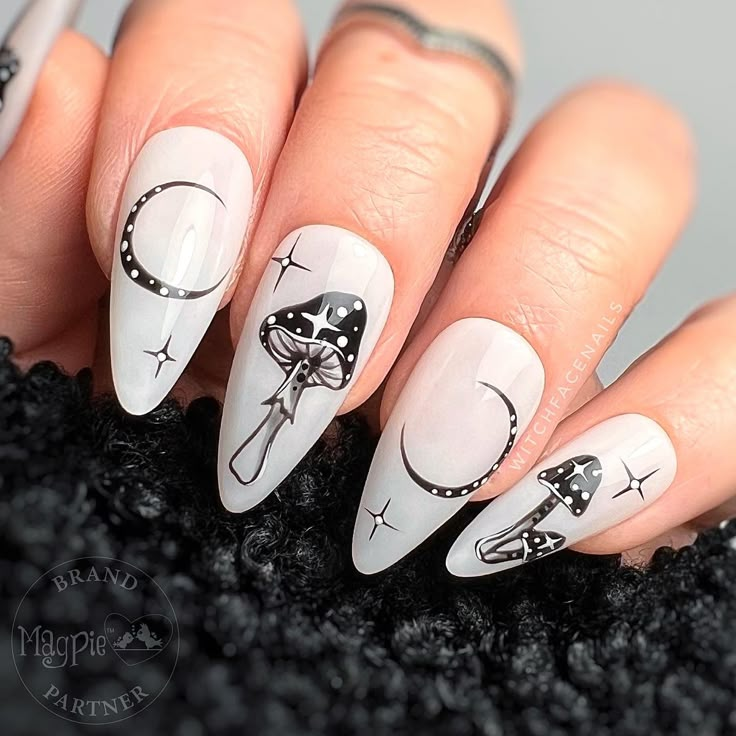 Hand painted moon and mushroom press ons. #fashion #cottagecore #mushroomcore #fairycore #moonlovers #pressonnails #pressons #pressonnailsforsale #pressonfalsenails #witchythings #witchyvibes #witchesofinstagram #witch #cottagedecor #alternative #nailart #nails #moontattoo #milkynails #mushrooms #celestial #celeste #vintagestyle #monochrome #trippynails #trippy #nailsofinstagram #nailsoftheday #handpaintednailart #witchfacenails #witchcraftforbeginners #fungi #quirky #nailinspiration #nailartide Goth Mushroom Nails, Black And White Mushroom Nails, Mushroom Themed Nails, Luna Moth Nail Art, Nails Mushroom Design, Nails With Mushrooms, Mushroom Acrylic Nails, Trippy Mushroom Nails, Mushroom Nails Art