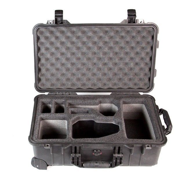 an open gray case filled with lots of different items on a white background and black handles