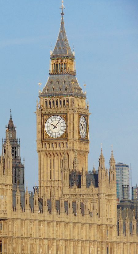 the big ben clock tower towering over the city of london