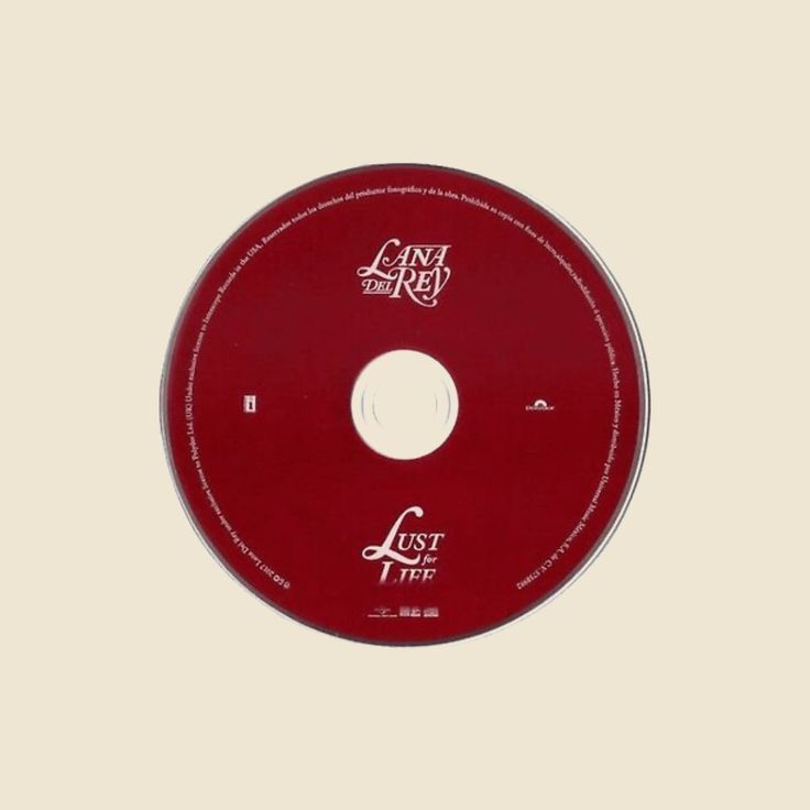 a red cd disc with the words lost tree on it's front and side