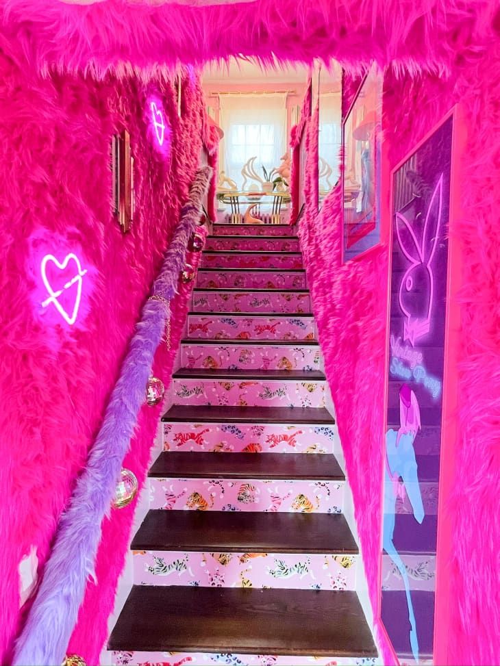 the stairs are decorated with pink and purple decorations