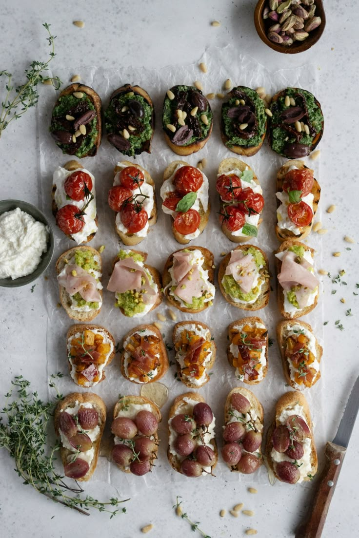 an overhead view of small sandwiches with toppings on them and the words crostini how to make them step - by - step