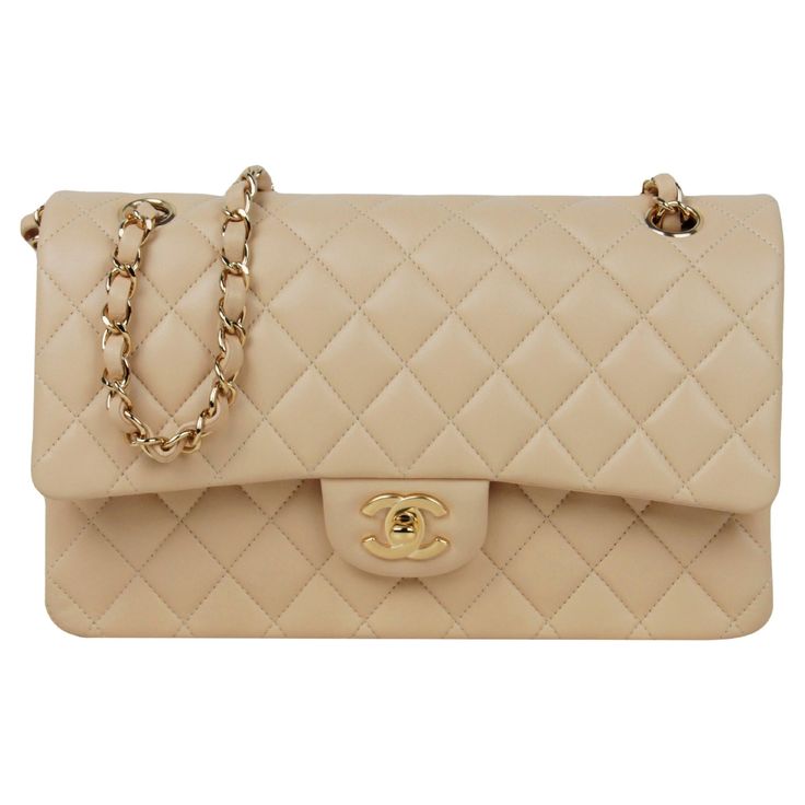 Chanel Beige Lambskin Leather 10" Medium Double Flap Classic Bag with Goldtone Hardware Made In: France Color: Light beige, gold Hardware: Goldtone Materials: Lambskin leather, metal Lining: Beige leather Closure/Opening: Flap top with CC twistlock and snap flap under Exterior Pockets: Half moon patch pocket Interior Pockets: Zipper pocket on top flap, back section under top flap, two wall pockets in middle section, front section Exterior Condition: Excellent Interior Condition: Excellent Includ Beige Chanel Classic Flap Outfit, Chanel Flap Bag Beige, Chanel Bag Classic Flap, Chanel Double Flap Bag, Chanel Bag Classic, Chanel Double Flap, Chanel Classic Flap Bag, Chanel Beige, Chanel Top