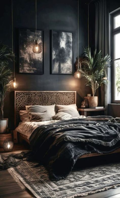 a bedroom with black walls and wooden floors, large bed surrounded by potted plants