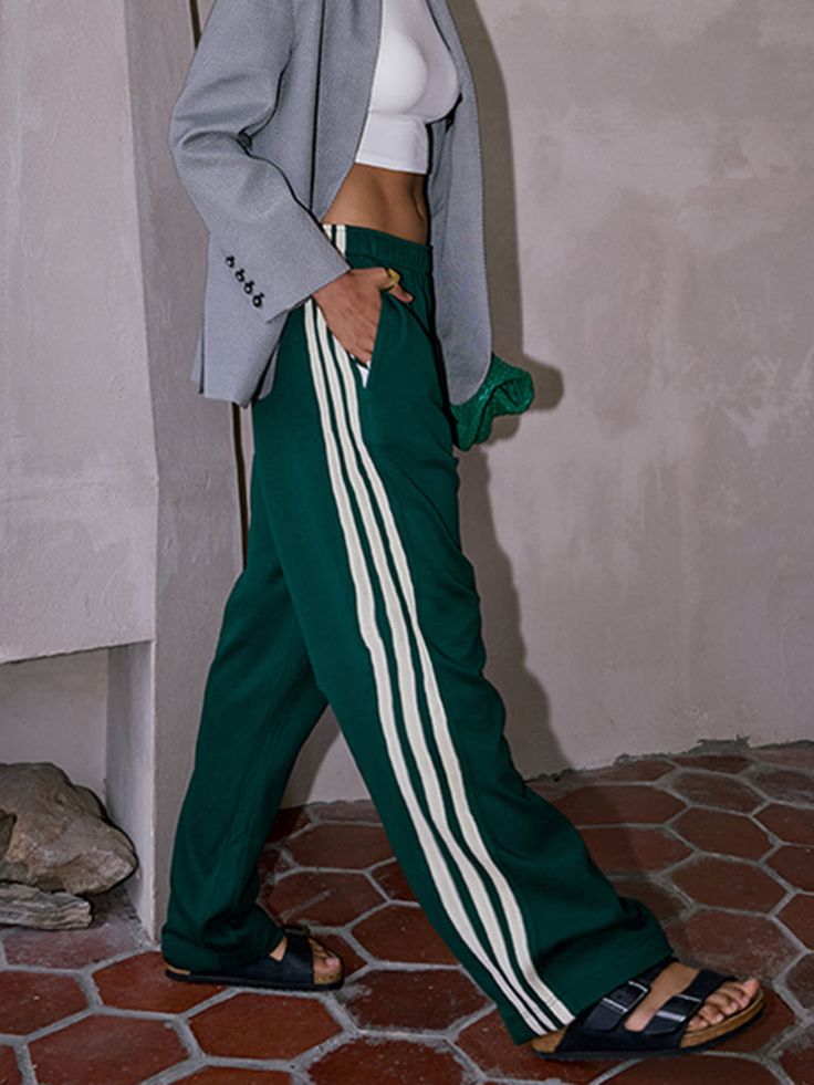 Casual Striped Patchwork Pants Affordable Adidas Sporty Pants, Adidas Womens Sweats, Madrid Street Style Summer, Green Side Stripe Pants For Streetwear, Green Pants With Side Stripes For Streetwear, Green Sweatpants With Side Stripes For Streetwear, Green Streetwear Pants With Side Stripes, Green Athleisure Bottoms With Side Stripes, Green Bottoms With Side Stripes For Streetwear