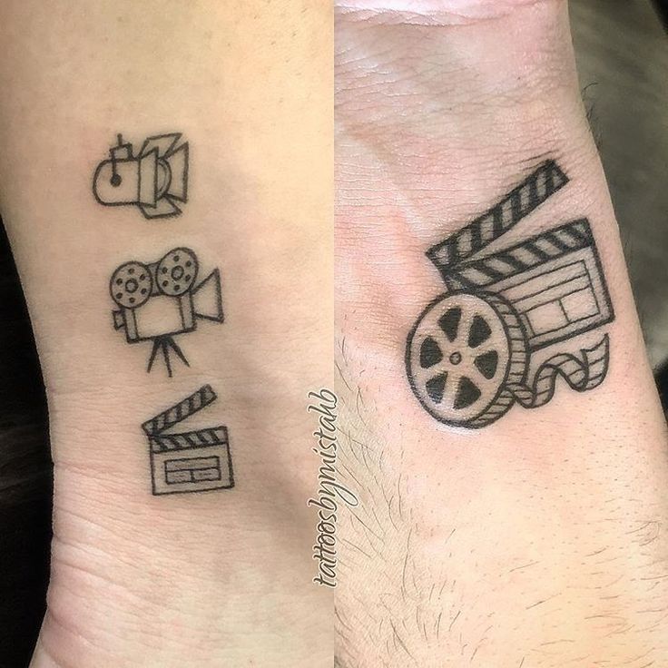 two people with matching tattoos on their feet, one has a camera and the other has a movie reel