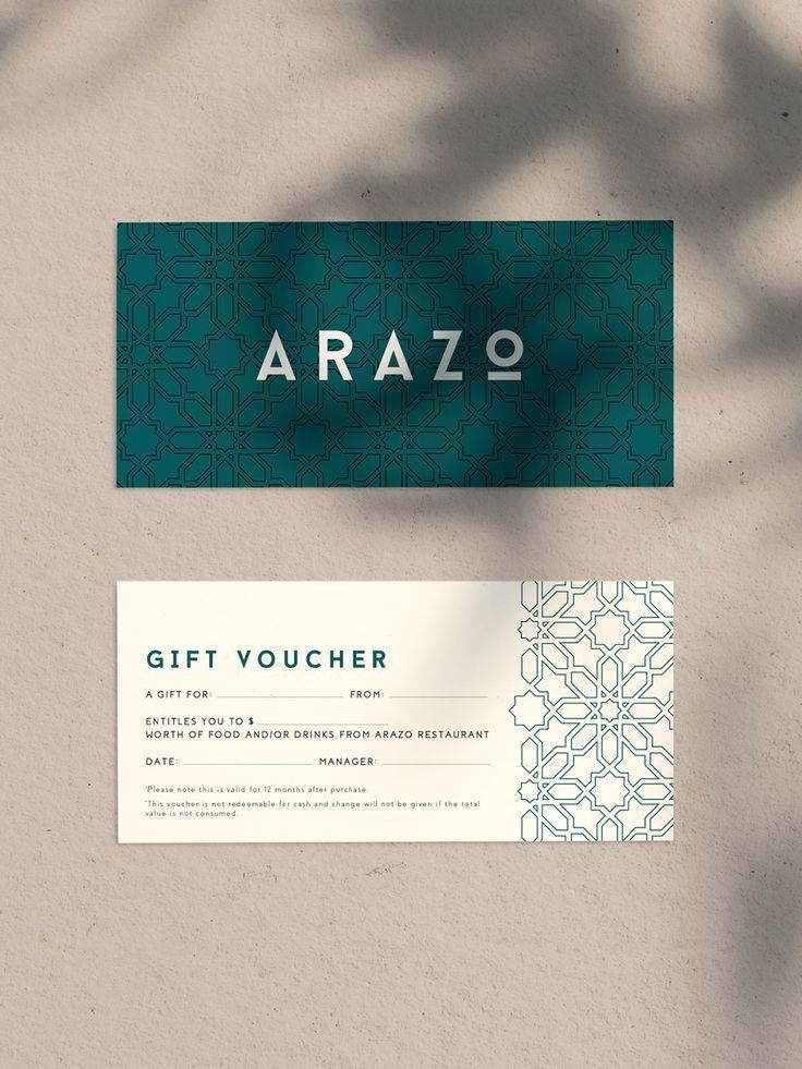 two gift vouchers sitting on top of a table next to each other with the word arza written across them